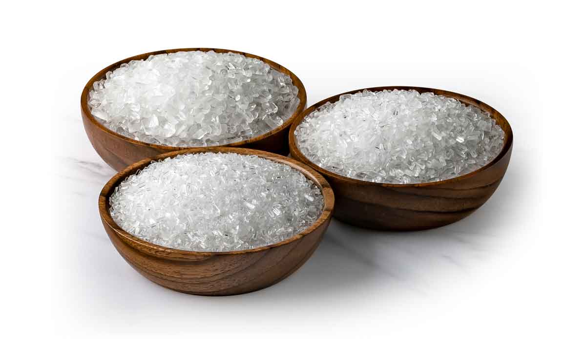 Ultra EpsomÂ® Premium USP grade epsom salt in wood bowls