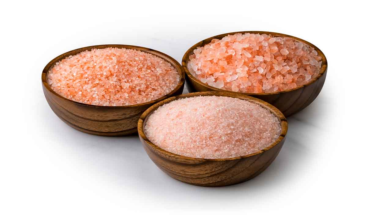 Ancient OceanÂ® Himalayan pink bath salts in wood bowls